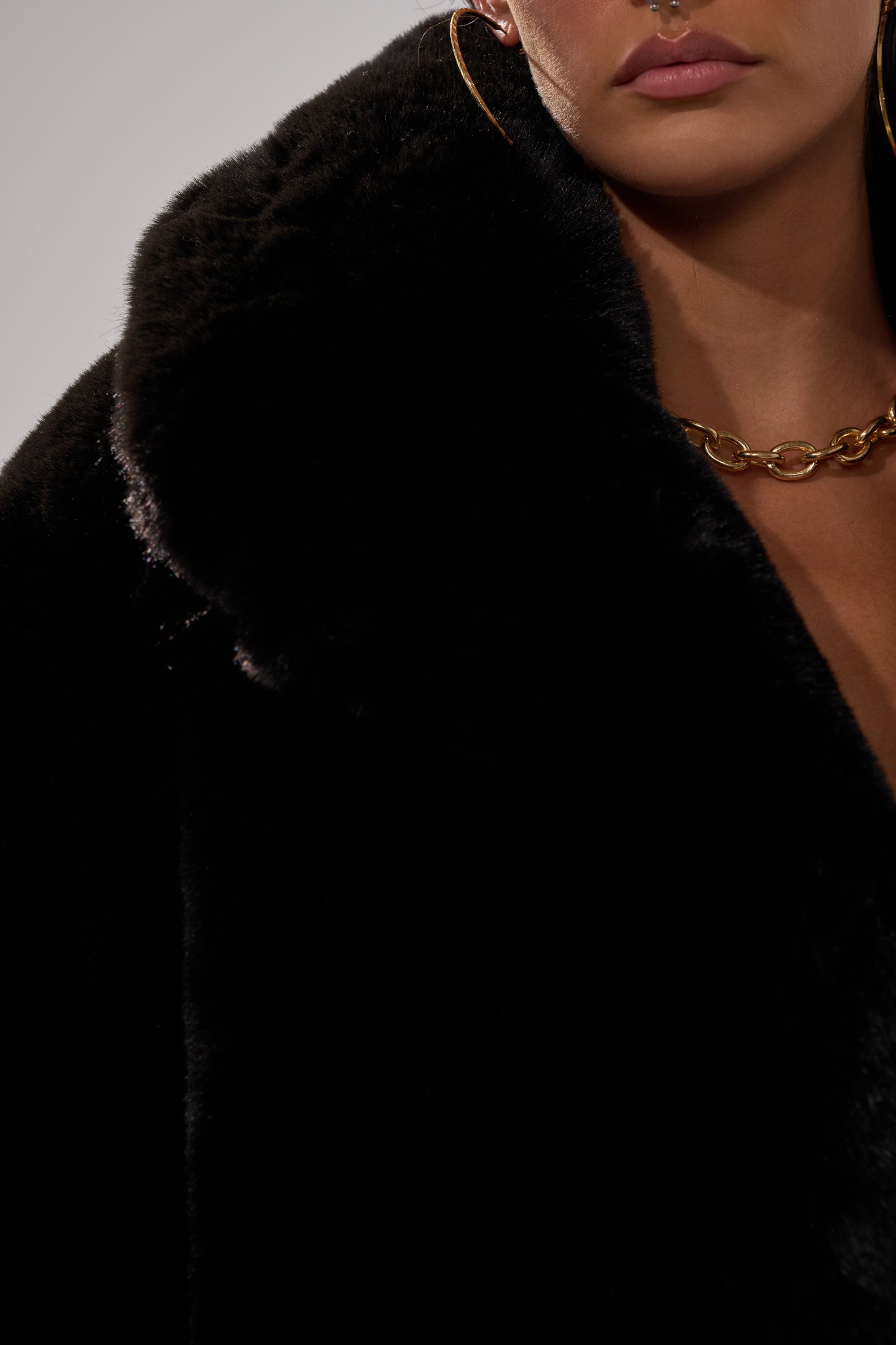NO LOOKING BACK FAUX FUR IN BLACK